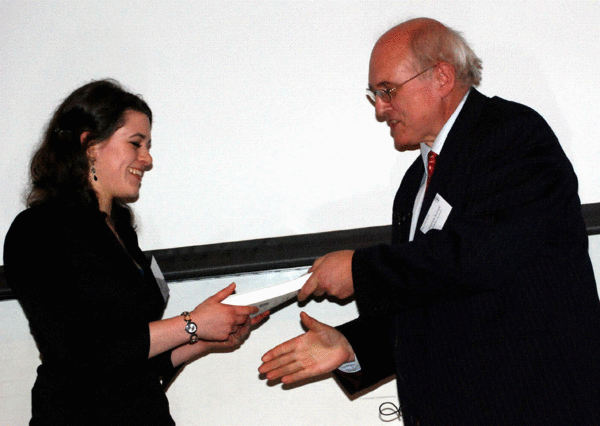 Rebecca Blackburn receiving the BA Archaeology Dissertation Prize from the President